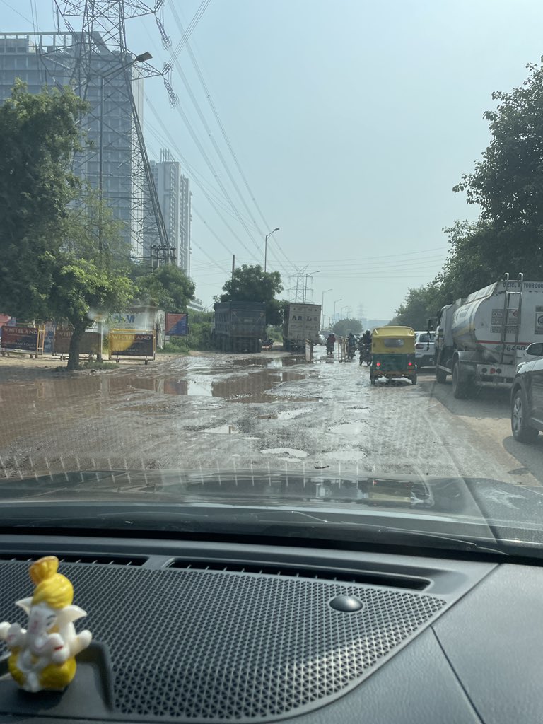 mvarsh89's tweet photo. @cmohry @OfficialGMDA @TOIGurgaon This is daily situation at Baba Jaharveer Goga chowk at SPR. No action on the road construction. Just in front of Police Chowk. Such a bad management of rainy season. https://t.co/URXOA1jqXD