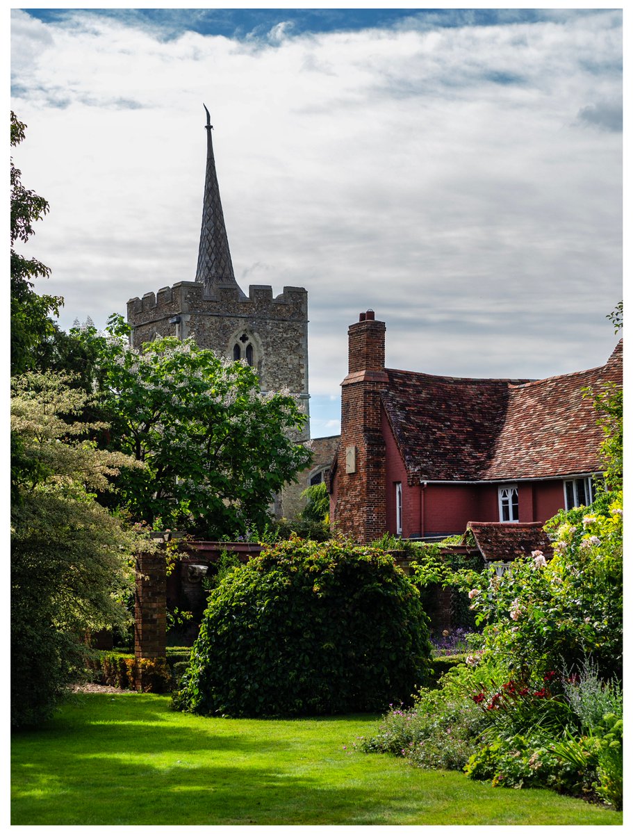 Looking back to warmer days from the garden of nearby Robynet House, open occasionally for charity fundraising visit in the village. It also gives one of the nicest views of St John's from without the boundary wall.