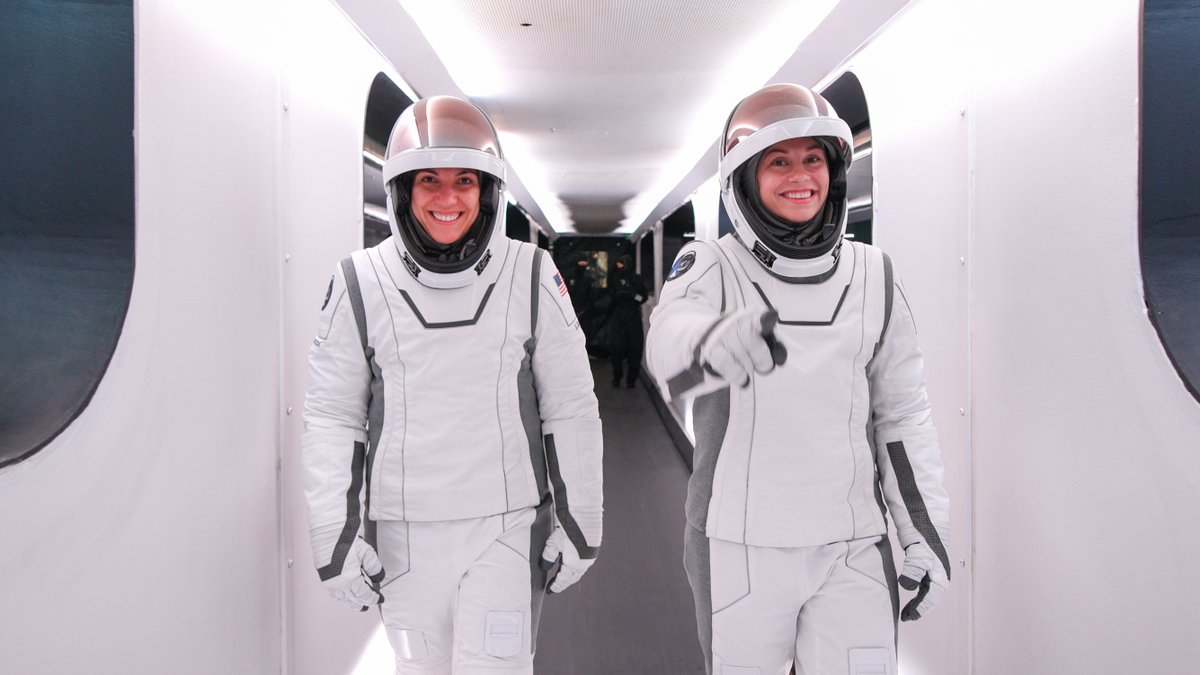 SpaceX's tweet image. Jared, Kidd, Sarah, and Anna walking down the crew arm ahead of entering Dragon