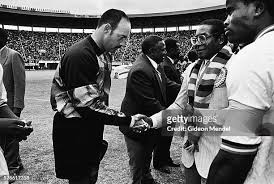 WanyeMusik's tweet photo. This is a picture of Robert Mugabe attending a soccer match bwt Zimbabwe warriors and Cameroon, at the NSS, 30 years later we hosting Cameroon in uganda, the current President is enjoy the new Pavillion. Let me mwiro b4 I disappear. https://t.co/3ob6EpdI6s