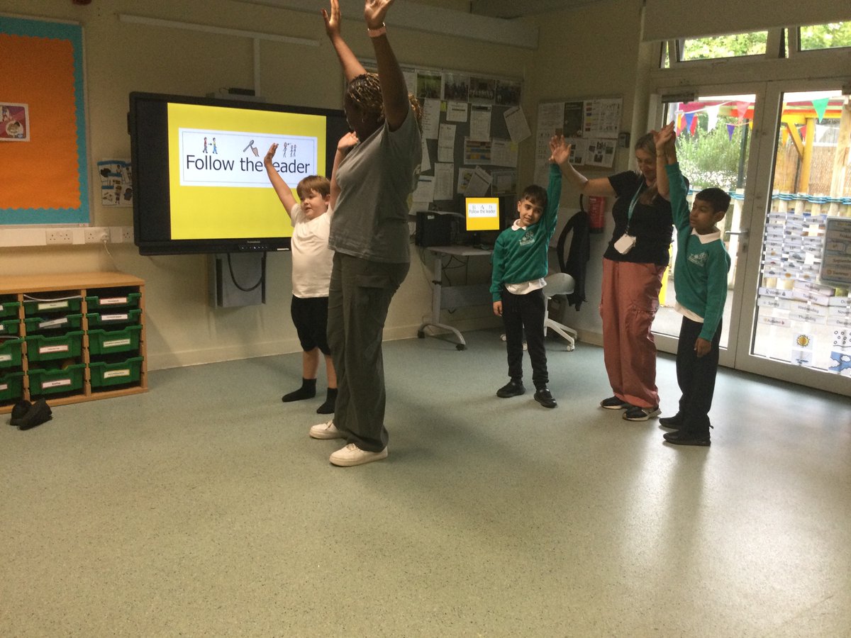WoodlandsHarrow's tweet photo. This week during Hazel class’s P.E session  pupils having been taking part in ‘follow the leader’ following an adult around  in a circle copying actions. They also copied actions to heads, shoulders, knees and toes first slowly and then as quick as they could!#physicaleducation https://t.co/WjCFofDUdn