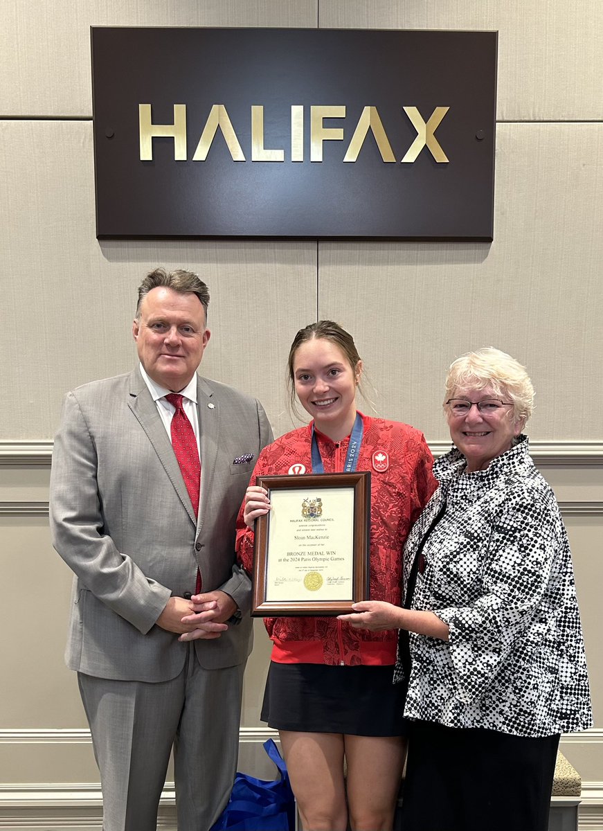 ReprtrPatHealey's tweet image. At HRM Regional council this morning Sloan MacKenzie of #WindsorJunction was presented a framed scroll by Deputy Mayor Cathy Deagle Gammon and @MikeSavageHFX for her bronze medal at Paris 2024. Photo submitted @CanoeKayakCAN #FallRiverNS
