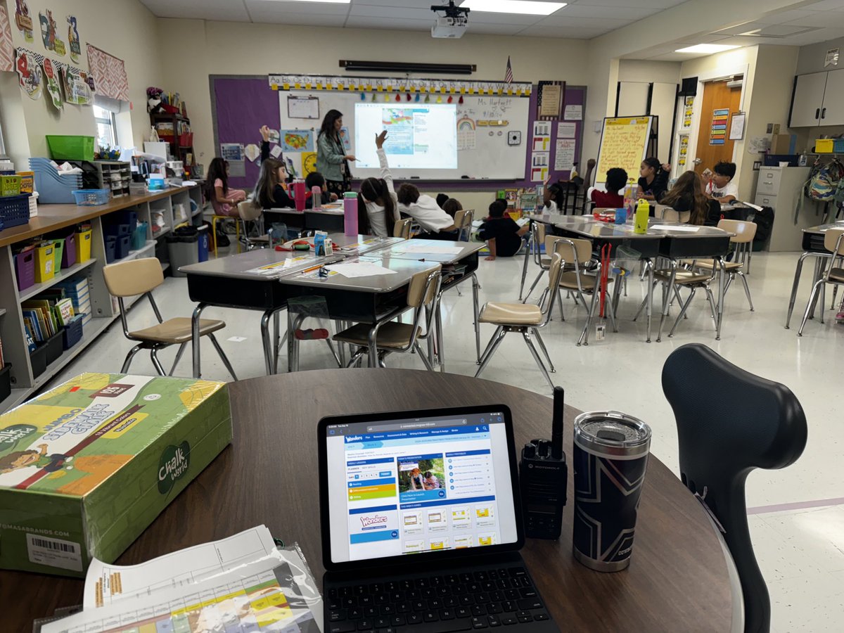 2nd grade reviewing the Essential question on how friends help friends from their shared reading today 🦅