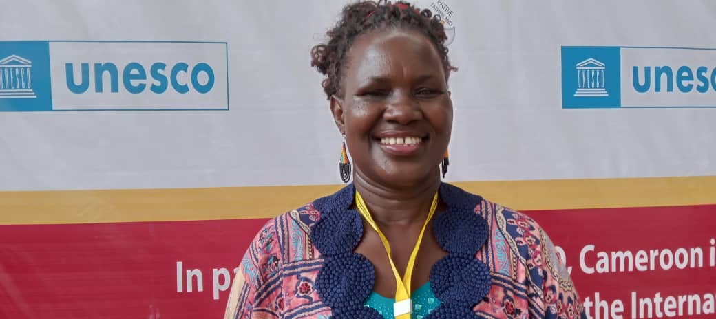 UNSAIuganda's tweet photo. Dorothy Nakato, a Ugandan woman with disabilities, #UNESCOConfuciusLiteracyAwardee2023 participating in the #UNESCO Global International Literacy Day in #Cameroon. Literacy is not only a basic skill but participation in Community.@UNESCO @IDA_CRPD_Forum @NUDIPU @DorothyMubezi https://t.co/AoWvaJarjw