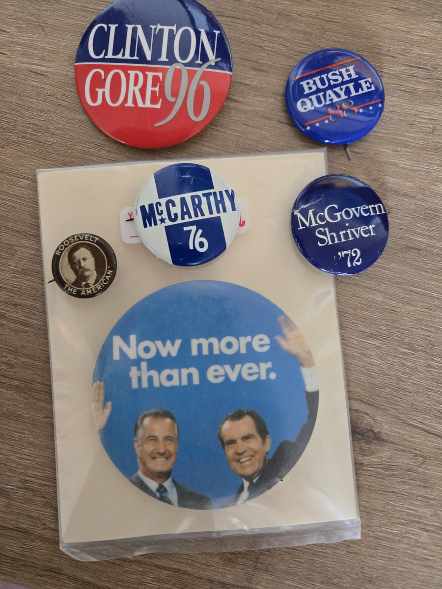 With the big debate upon us, I dug out some old fashioned political pins I collected. I miss the old metal campaign pins