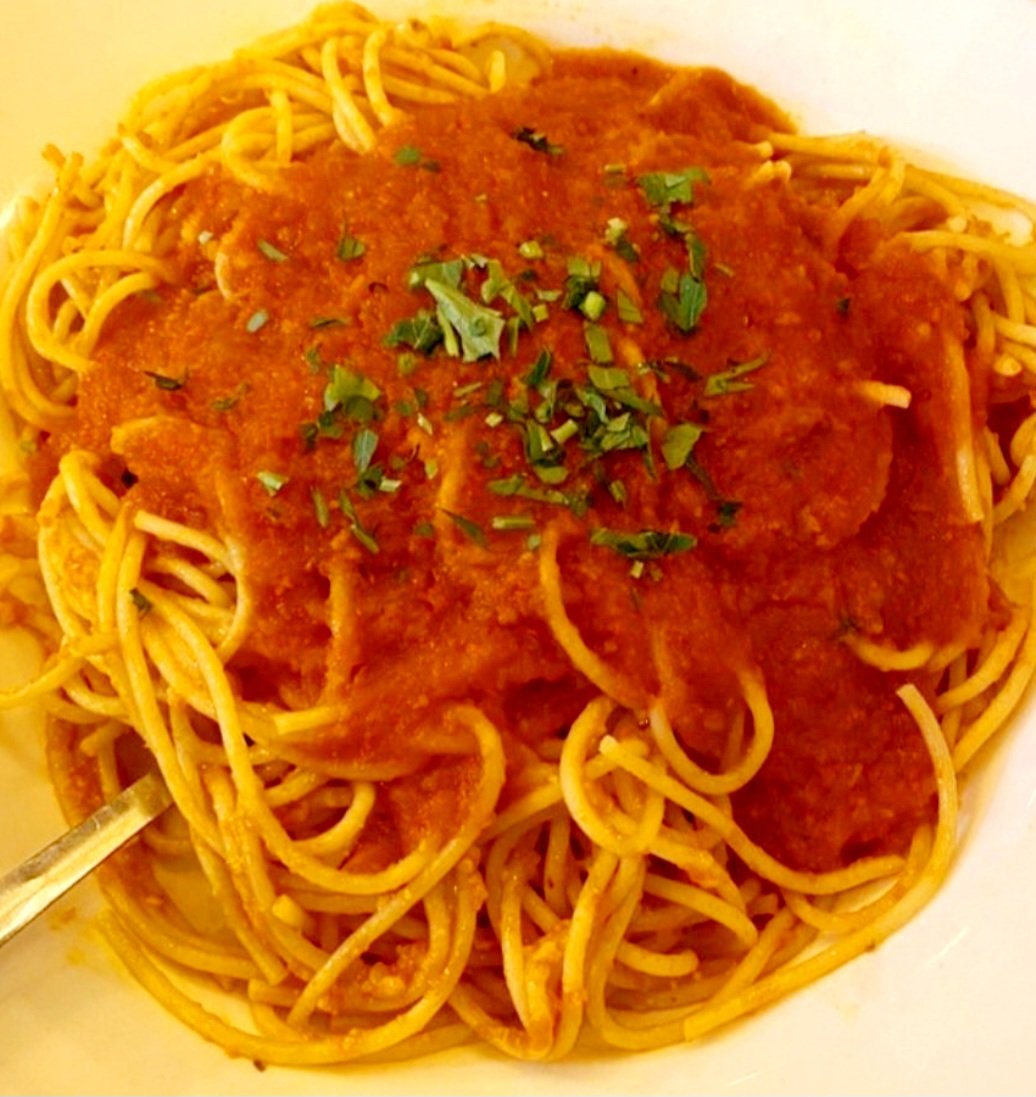 Our Spaghetti Pomodoro, a timeless Italian classic, showcases perfectly al dente pasta enveloped in a vibrant, velvety tomato sauce, harmoniously infused with garlic, basil, and a hint of olive oil.#kennyscastaways