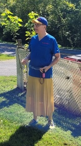 A man in a dress has just been caught trespassing at our old location.

I'm not sure what is going on or what he's holding, a fight may have broken out. I'm not there.

We are concerned this may be related to the death threats we've been receiving.