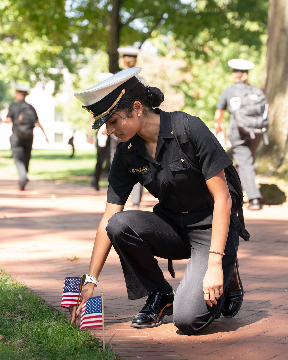 Today, the midshipmen placed 2,977 small US flags along Stribling Walk to honor each American who lost their lives on Sept. 11, 2001. Of these flags, 14 larger ones were placed to honor our Naval Academy alumni who died that day.