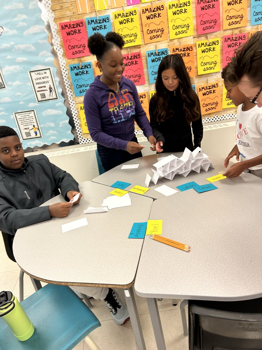 MsWood26's tweet photo. Last week some of the @StElizabethOCSB Grade 4s and 5s had fun mixing get-to-know you games with STEM challenges! In this game they made towers out of index cards, but they had to write or draw things they had in common on each one. #ocsbBeCommunity https://t.co/xc3gGNyqsb