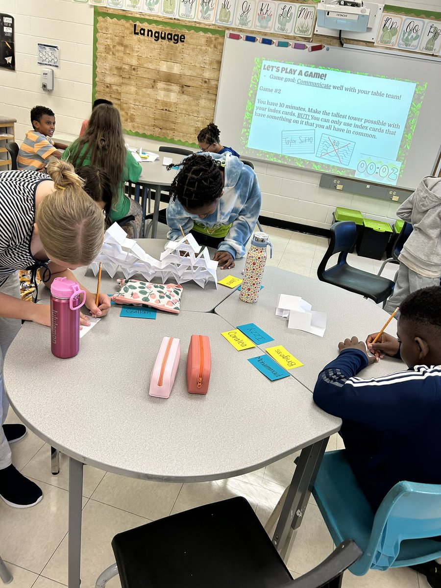 MsWood26's tweet photo. Last week some of the @StElizabethOCSB Grade 4s and 5s had fun mixing get-to-know you games with STEM challenges! In this game they made towers out of index cards, but they had to write or draw things they had in common on each one. #ocsbBeCommunity https://t.co/xc3gGNyqsb