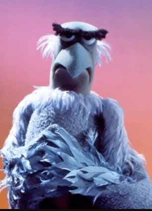 I finally figured out why David Muir of <a href="/ABC/">ABC News</a> is such a comforting debate moderator. He's Sam the Eagle!