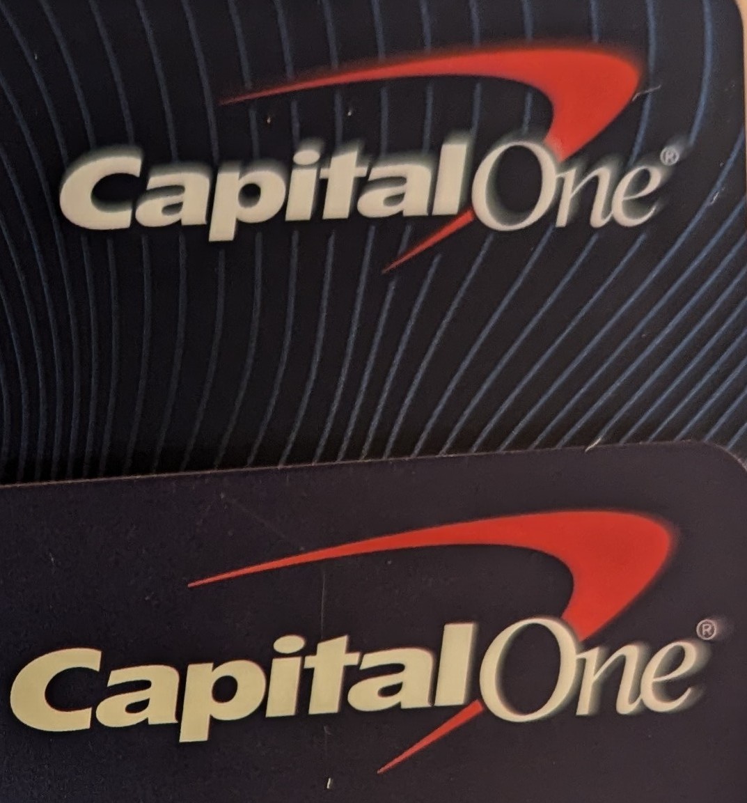LogicalTechnia's tweet photo. ok @CapitalOne 
Explain why the size of the logo is just slightly different between the Platinum card and the regular Debit card.
These are taken with them stacked, the Platinum card logo is clearly smaller. https://t.co/TCN8SQtobD