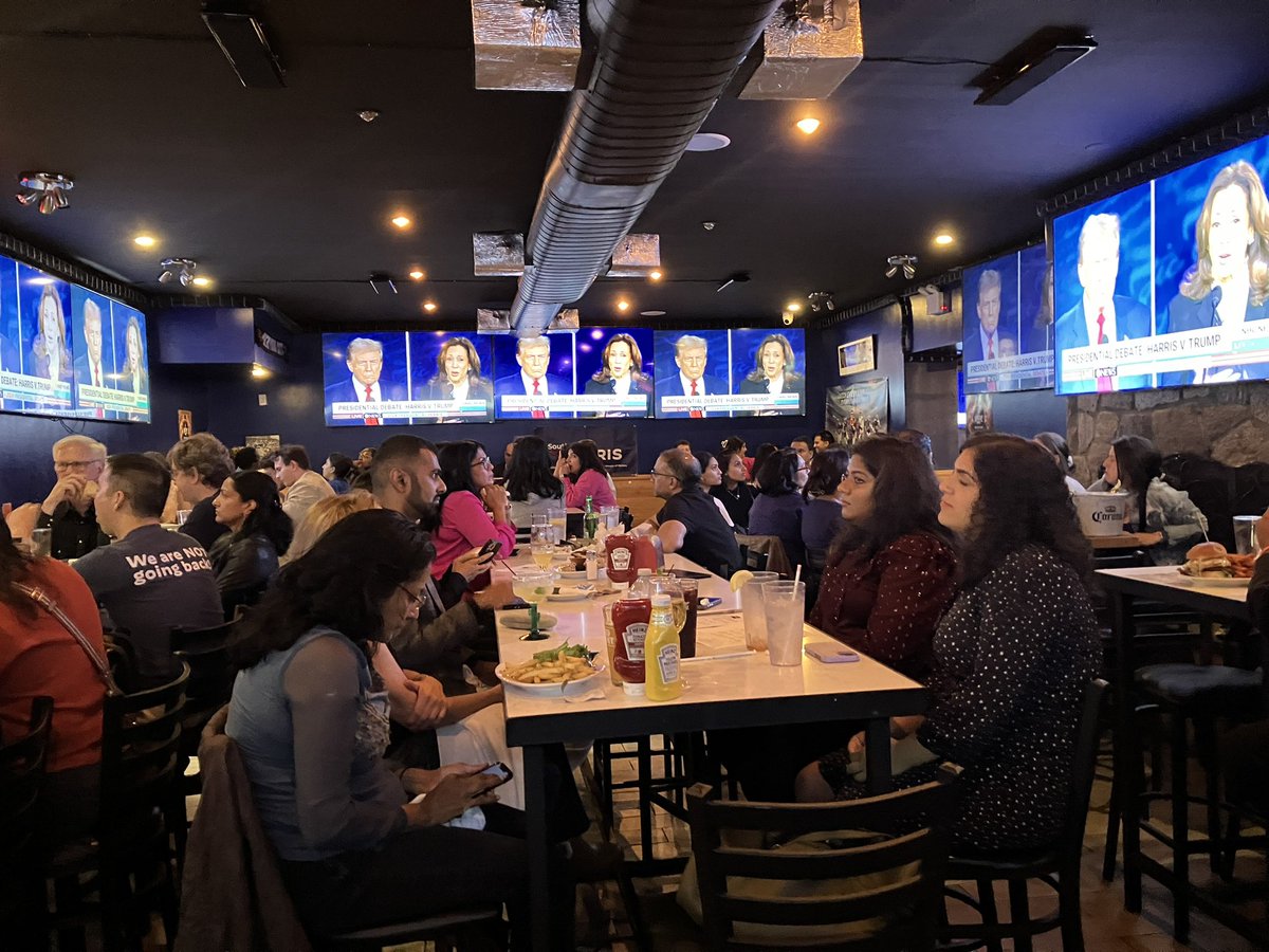 TNYC2's tweet photo. So excited for the turnout at this @SAforHarris debate watch party. We are watching @VP killing it!  #WeAteWithKamala #SouthAsiansforHarris https://t.co/RUqFgFmhxq