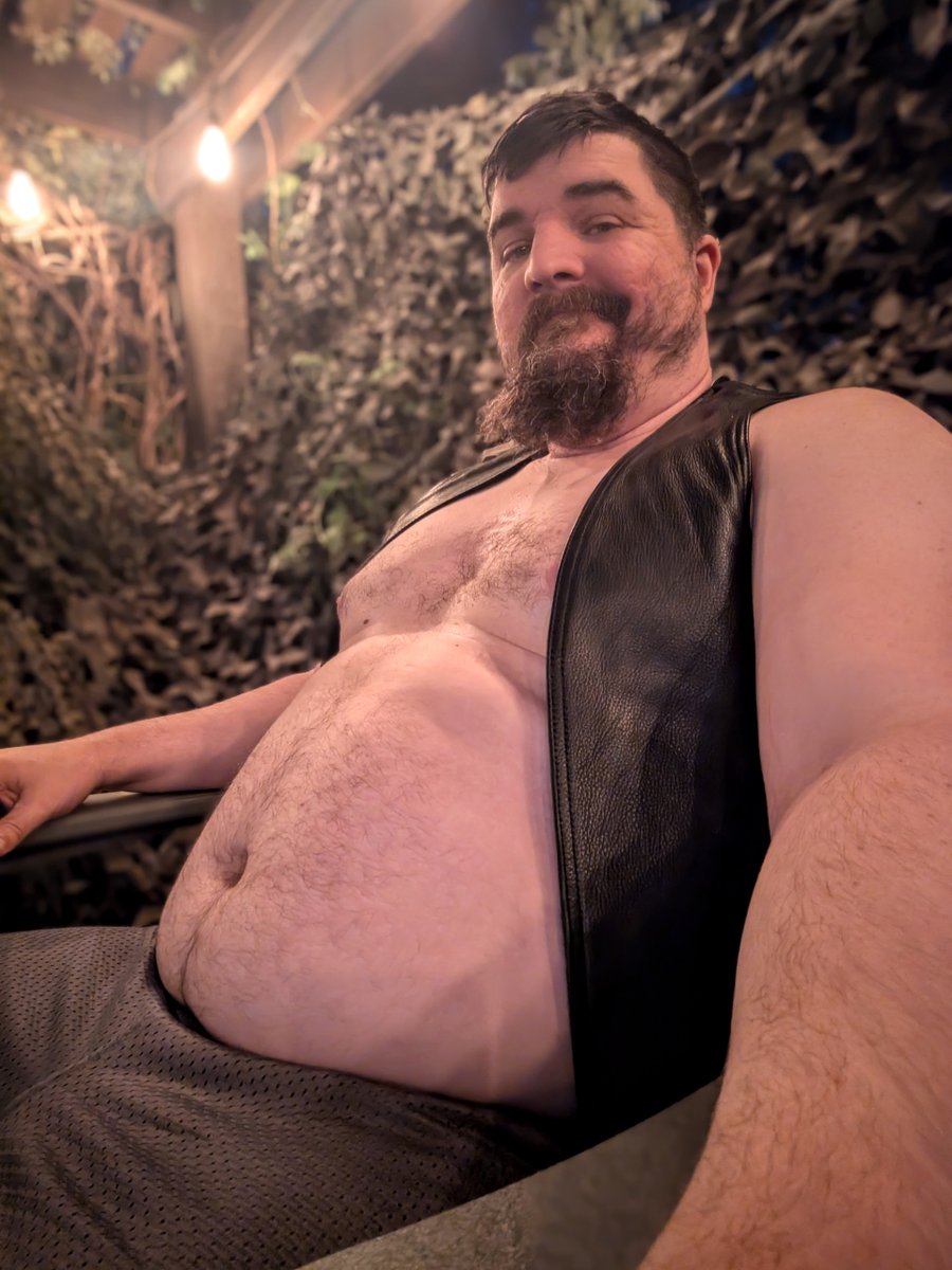 Gorgeous weather outside to lounge on the deck in a little bit of leather while the boy has a cigar.