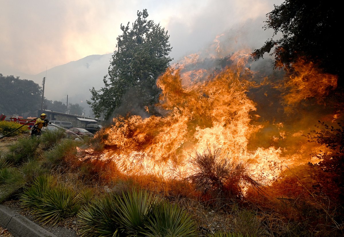 The #bridgefire exploded by burning 30,000+ acres today advancing into the historic Mt. Baldy Village.