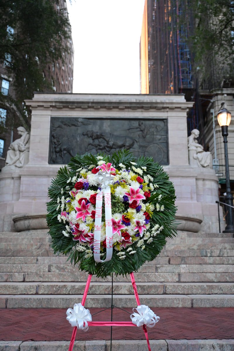 FDNY's tweet photo. Fire Commissioner Robert Tucker and Acting Chief of Department John Esposito laid a wreath at the Firemen’s Memorial. We will #NeverForget the 343 members who made the Supreme Sacrifice 23 years ago. https://t.co/e8EbZ0Myb7