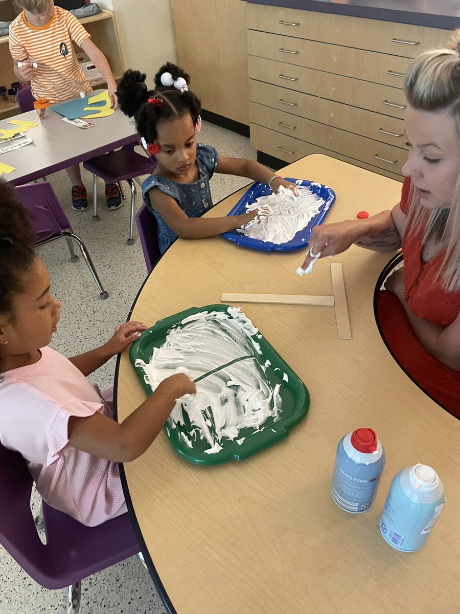GernerCenter's tweet image. Students in Mrs. Rash’s classroom practice their letters with shaving cream. They made the straight lines down and across to make the letter T. What a great day!