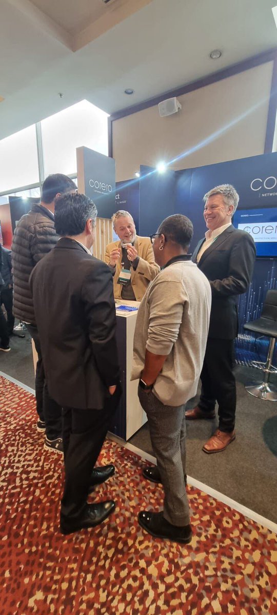 Corero's tweet photo. What an amazing experience at #CONECTAChile! Our booth was buzzing, and we loved sharing our #DDoS insights as a panelist. Thanks to everyone who joined us—exciting things ahead! 🔥💡 #DDoSProtection #Networking https://t.co/5SOCVUR5GU