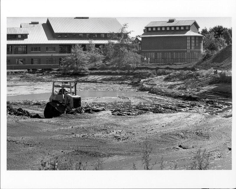 BatesAlumni's tweet photo. "The Puddle" then and now! 

The first photo shows the restoration of Lake Andrews in the 90s. Can you guess what they found at the bottom?🤔 

#batecollege #thepuddle #batesalumni https://t.co/soCNim7zce