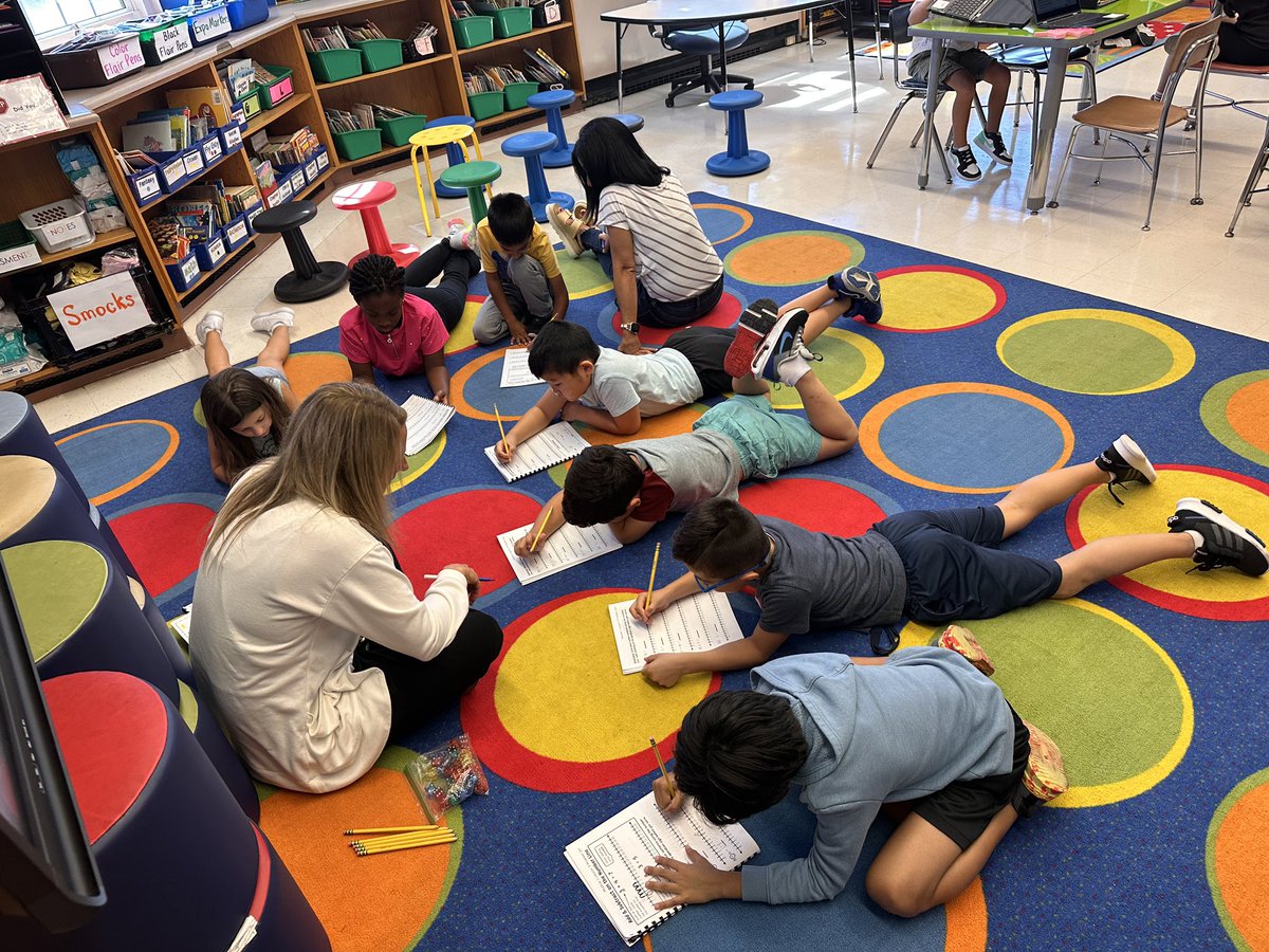 Working hard in our Math rotations! ✏️ #EWLearns