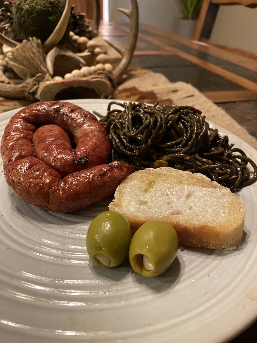 SuzieQuackers2's tweet photo. Made in #Ok Loveras Italian Sausage, Squid Ink black Pasta with Capers and Paprika, Garlic stuffed Olives and B&B! #TwoTrickPony #WishUWereHere https://t.co/Qp9zoq1hxJ