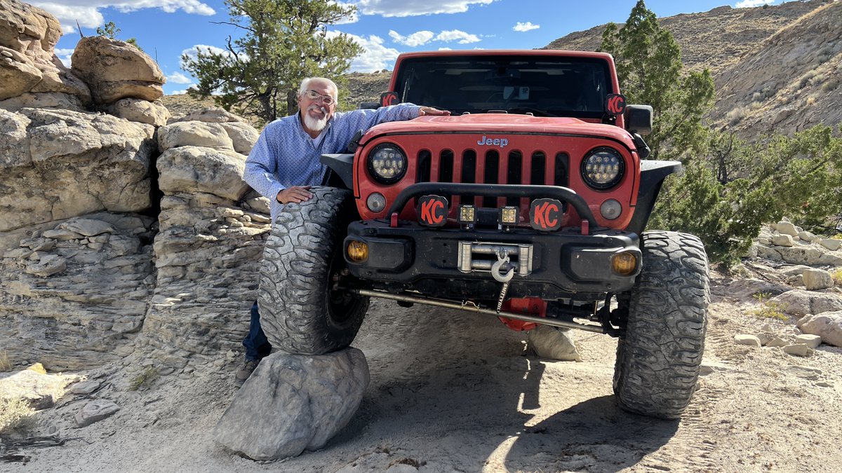 Awe, Dan!
Doesn't this picture depict Wyoming Jeeper Dan Flores perfectly? His Jeep is flexing on a rock - front and back tires. He has his big smile going and of course, he's giving his Jeep a big hug!
#jeepwrangler
