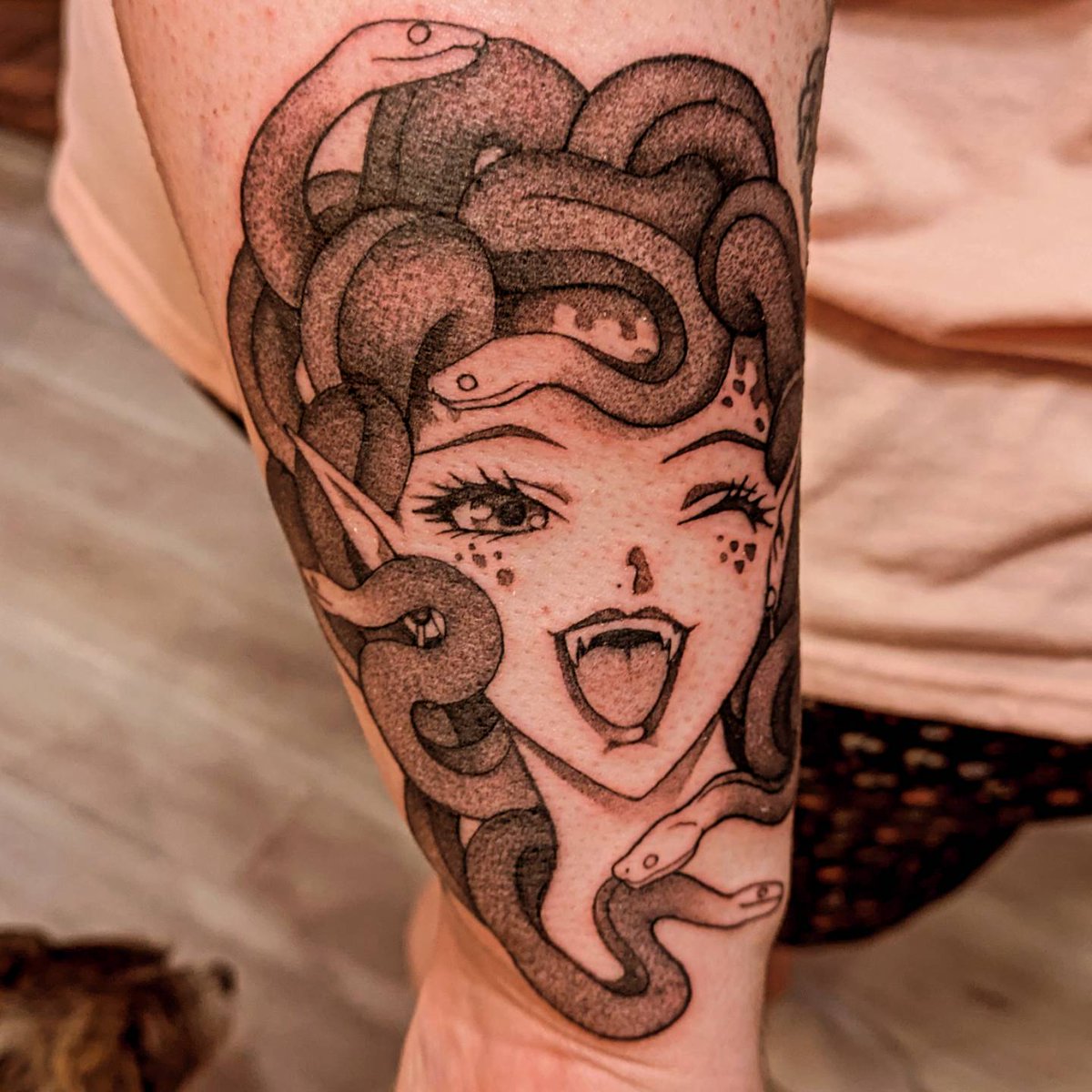 "You only have to look at the Medusa straight on to see her. And she's not deadly. She's beautiful and she's laughing." 🐍❤️

Tattoo #12 (technically 11? because she's also covering a flash I got that I didn't like)

#animetattoo #medusatattoo