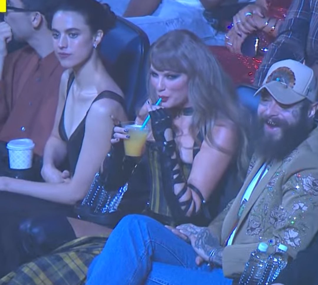 redwinets's tweet photo. taylor and her little drink against the world https://t.co/C4cocLS9rI