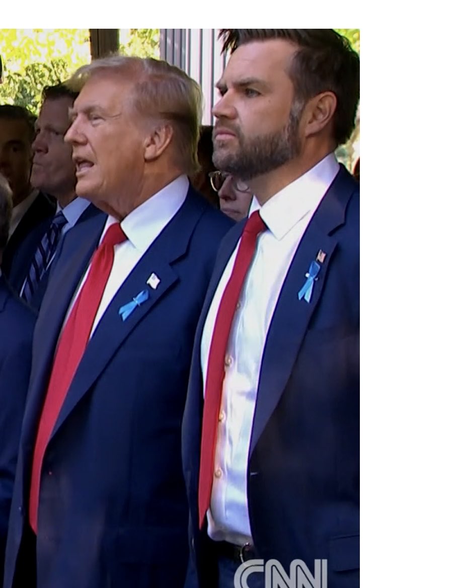 What’s with the Mini-Me outfit?