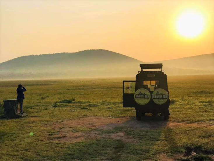 An unforgettable sunset experience in the vast wilderness of Akagera National Park, with the Land cruiser ready for wildlife viewing moments on a night safari to spot various nocturnal wildlife species. 
#visitrwanda #WildlifeEncounters#Rwandasafari