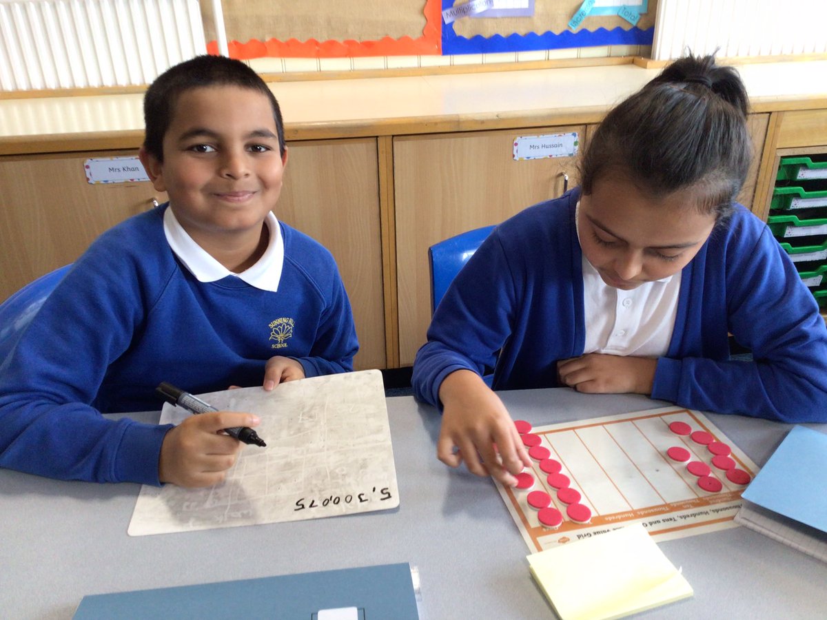 In Maths, 6P have been using counters and place value charts to read and write numbers up to 10,000,000.