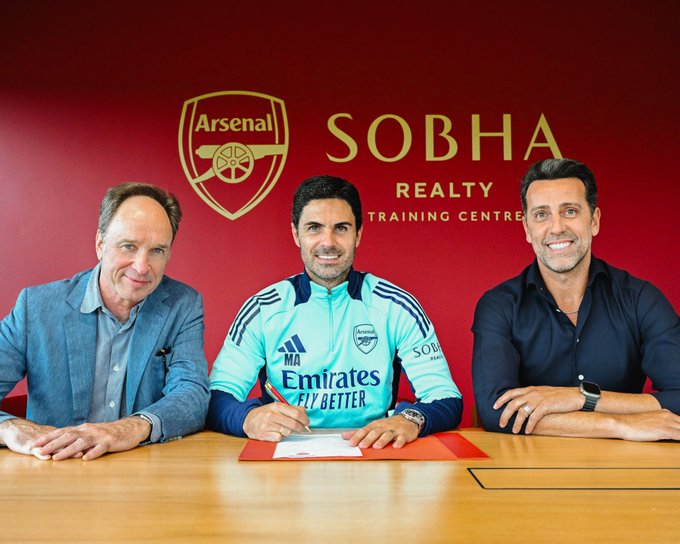 Mikel Arteta signs a new contract at Arsenal with Tim Lewis and Edu.