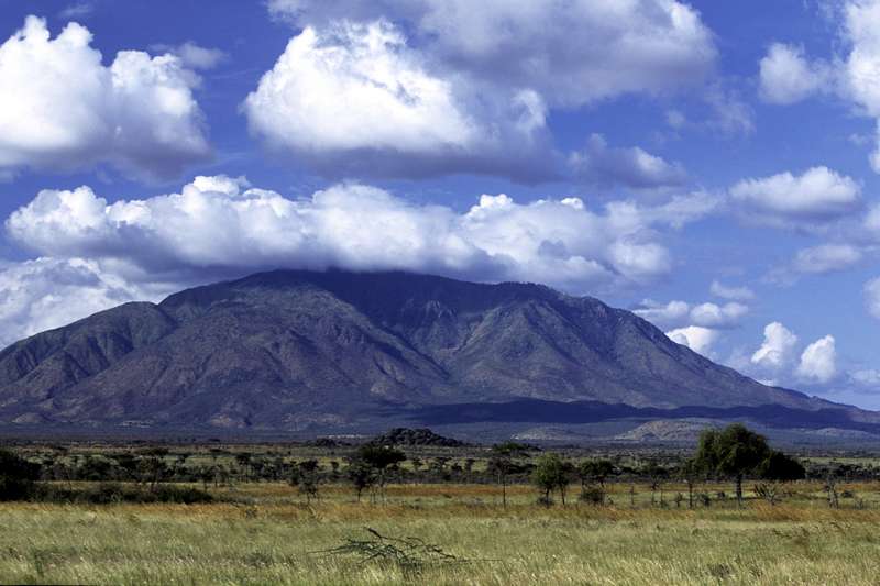 This is Mount Elgon whose earliest volcanic activity was 24 million years ago. 

Named originated from a Maasai word which means Breast Mountain.