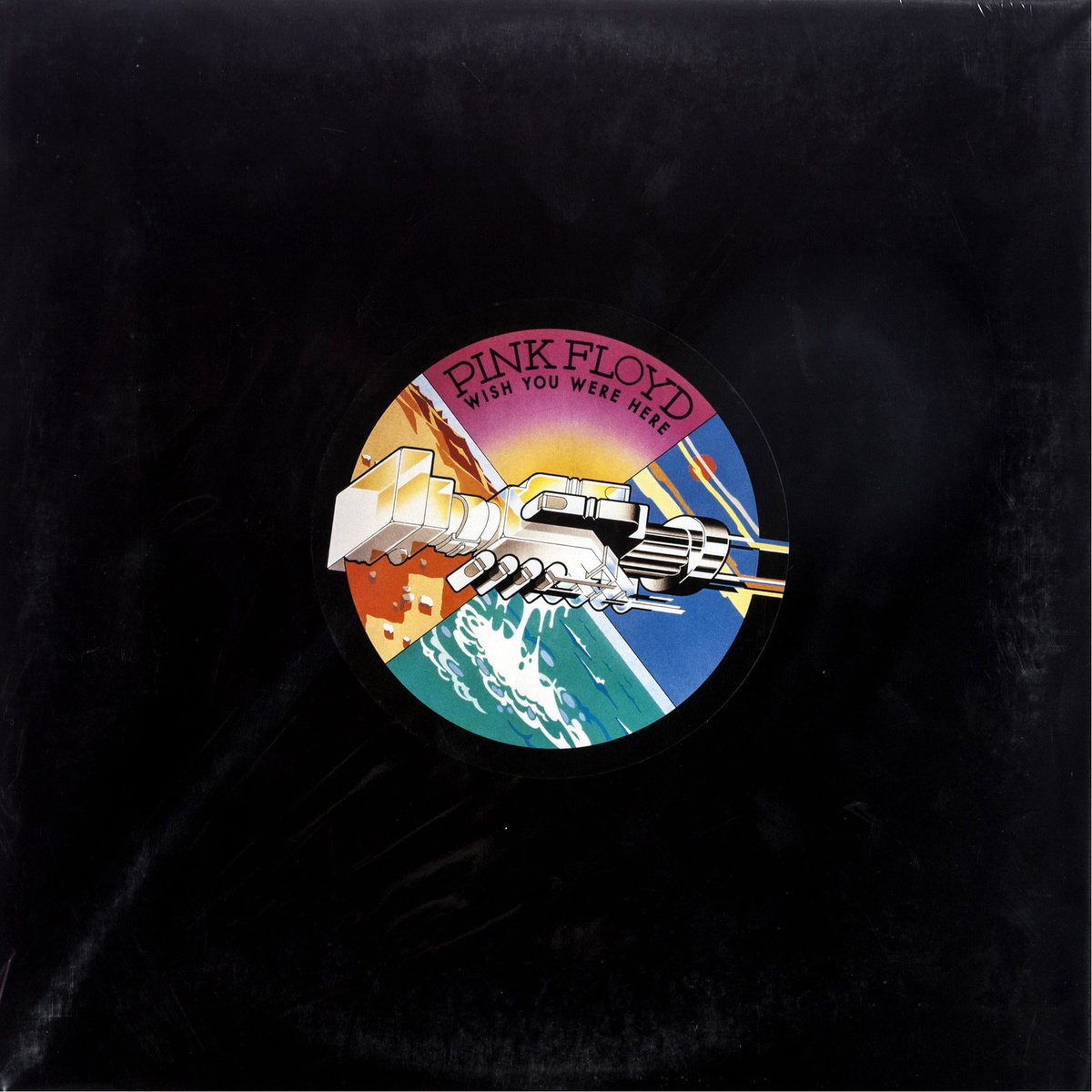 pinkfloyd's tweet image. Today in 1975 saw the UK release of Wish You Were Here. The theme of absence pervaded the album and its associated artwork with the multiple images illustrating this, shrink-wrapped in black plastic to cover the album - the absence of band name or album title being the ultimate…