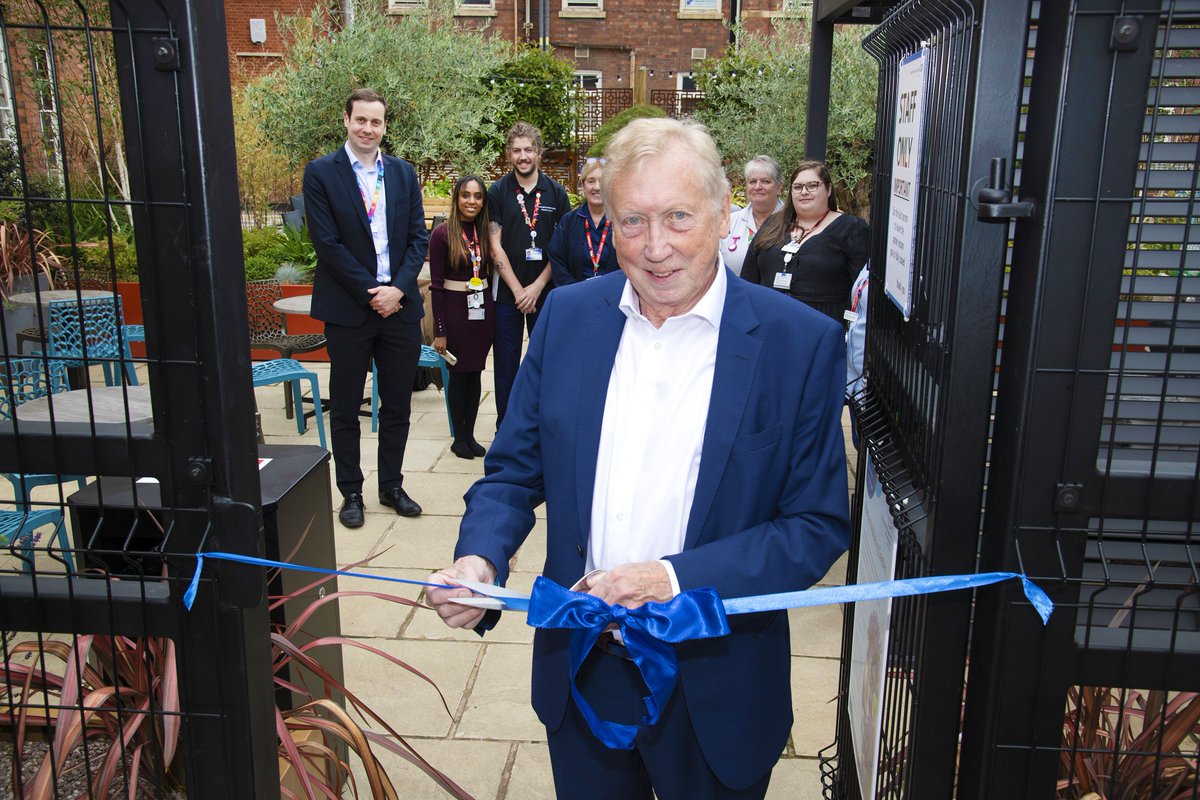 Leic_hospital's tweet photo. A wellbeing garden project conceived by our Emergency Department’s Shared Decision-Making Council has opened at Leicester Royal Infirmary. The garden was made possible by support from @DrFoxLHC and local philanthropist Richard Mackay, who cut the ribbon for the new facility. https://t.co/yAfzFYmDxn
