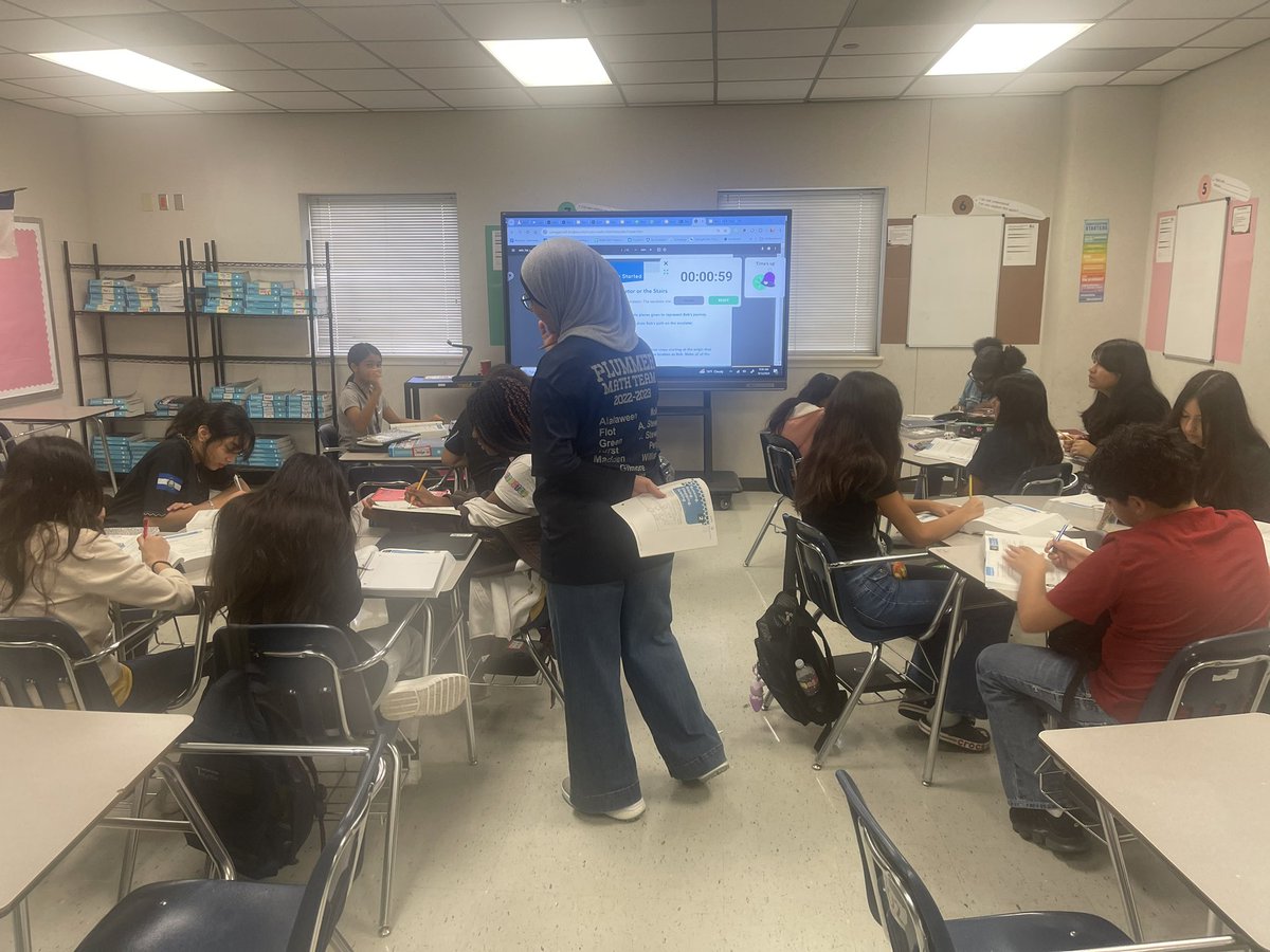 Mathlete429's tweet photo. I spy a TIG in Mrs. Alalaween’s hand 🔎 Expert facilitation move ⭐️ @PlummerMS_AISD @TeachLikeABosar @TRod_Math13 @principaldmac #AldineImpact #MathForward https://t.co/z85b8gOh0P
