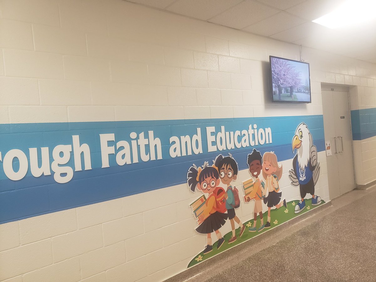 ocsb_il's tweet photo. St. Elizabeth is looking 'fresh' with a new paint job and decorations. What a nice way to start the year!  @stElizabethOCSB https://t.co/W8bsuaoHU4