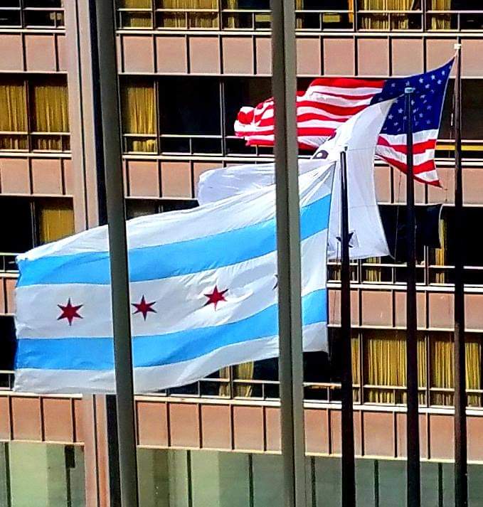 Chicago's, Cook County's, and America's flags are a' blowin' in the wind above the Daley Plaza outside my office window, and it's funny (thanks Kamala and Tim!) how much more I've been digging the American flag lately. (Chicago's flag's nice too.)