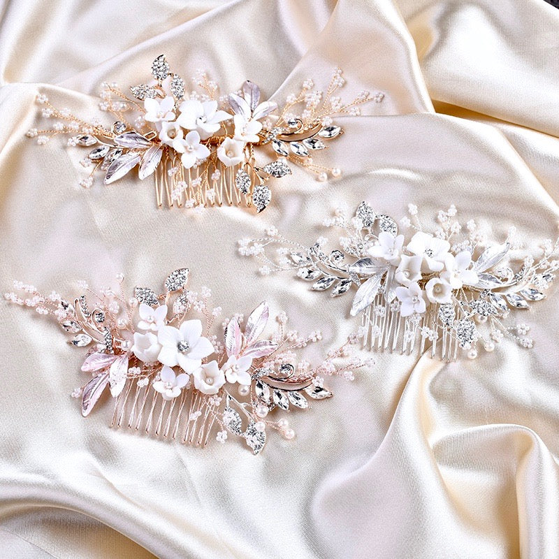 AdorabySimona's tweet photo. Delicate ceramic flowers are very much in vogue this #wedding season, which is all about femininity and romance. 
Available here: https://t.co/QGuFzwsMZk
.
.
.
#2024weddingtrends #bridal #haircomb #weddinghaircomb #ceramicflowers #bridalhaircomb  #adorabysimona https://t.co/vJxFrSddhB