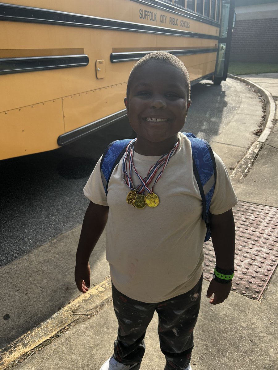 Caught this rockstar Brave hopping off the bus with his medals. He has already been caught being good FOUR times this year! <a href="/OES_Braves/">Oakland Elementary School</a> are kindness champs!!
