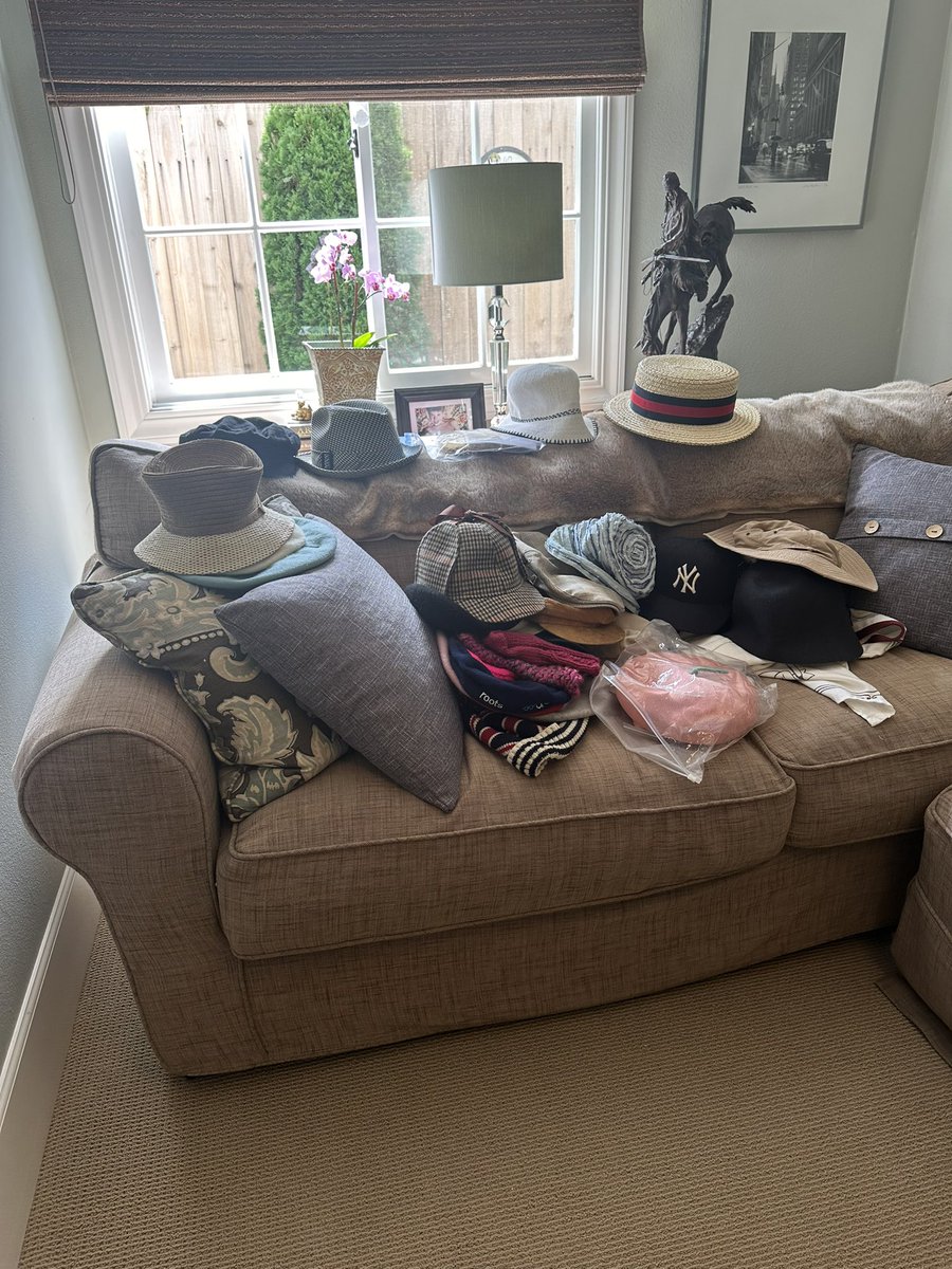 Childless cat lady in her glory, cleaning out hats.  🧢👒🎩🧢 #childlesscatlady