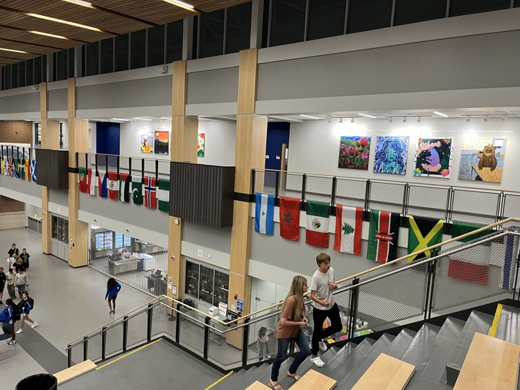 AHS_Bluepride's tweet photo. AHS is proud to welcome back students and staff with flags representing the diverse countries of origin within our school community. Thanks to the Attleboro Cultural Council for their support in making this happen.  52 flags and counting... https://t.co/B2VX3bXDUg