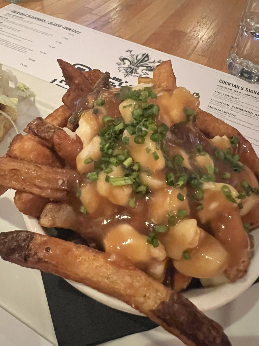 I tried poutine for the first time today in Montreal. The winning combination of fries, cheese curds, and gravy. So good, but so bad.