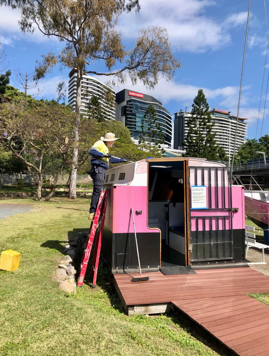 Our volunteer Michaell taking advantage of having a mop and bucket and some sugar soap to give the outside of our Ella’s Pink Lady mock cabin a wash. #qmm #ellaspinklady