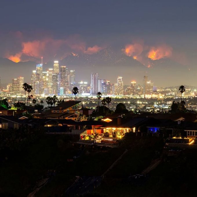 This photo of the Bridge Fire in the hills behind Los Angeles speaks to the fact that we are in the midst of a cataclysm and the vast majority of people have no idea.