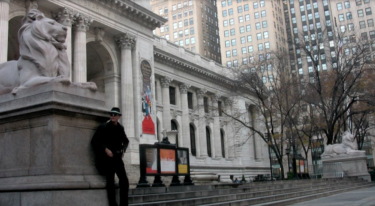 The SCAMMERHEAD awaits another potential
investor in front of another apex predator, 
the left stone lion at the New York Public Library.
@scammerhead now streaming free on <a href="/Tubi/">Tubi</a>:      tubitv.com/movies/1000162…
And GooglePlay: bit.ly/46u7iBC 
#FilmNoir #NewYorkNoir #Tubi