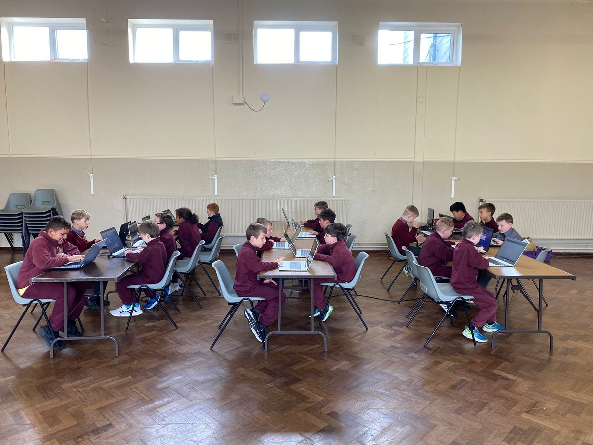 Ms. Kearney’s 3rd class enjoying computer class this morning.