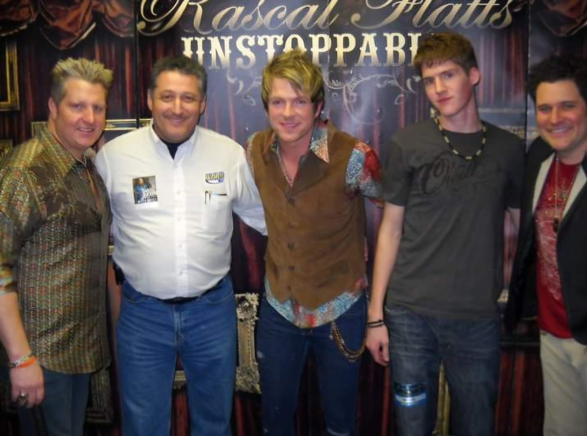 A.J. McCloud (@ajmccloud1) on Twitter photo Happy Birthday to Joe Don Rooney of <a href="/rascalflatts/">Rascal Flatts</a> (center). He is between my son and me. What is your favorite Flatts song? Happy Birthday to Joe Don Rooney of <a href="/rascalflatts/">Rascal Flatts</a> (center). He is between my son and me. What is your favorite Flatts song?
