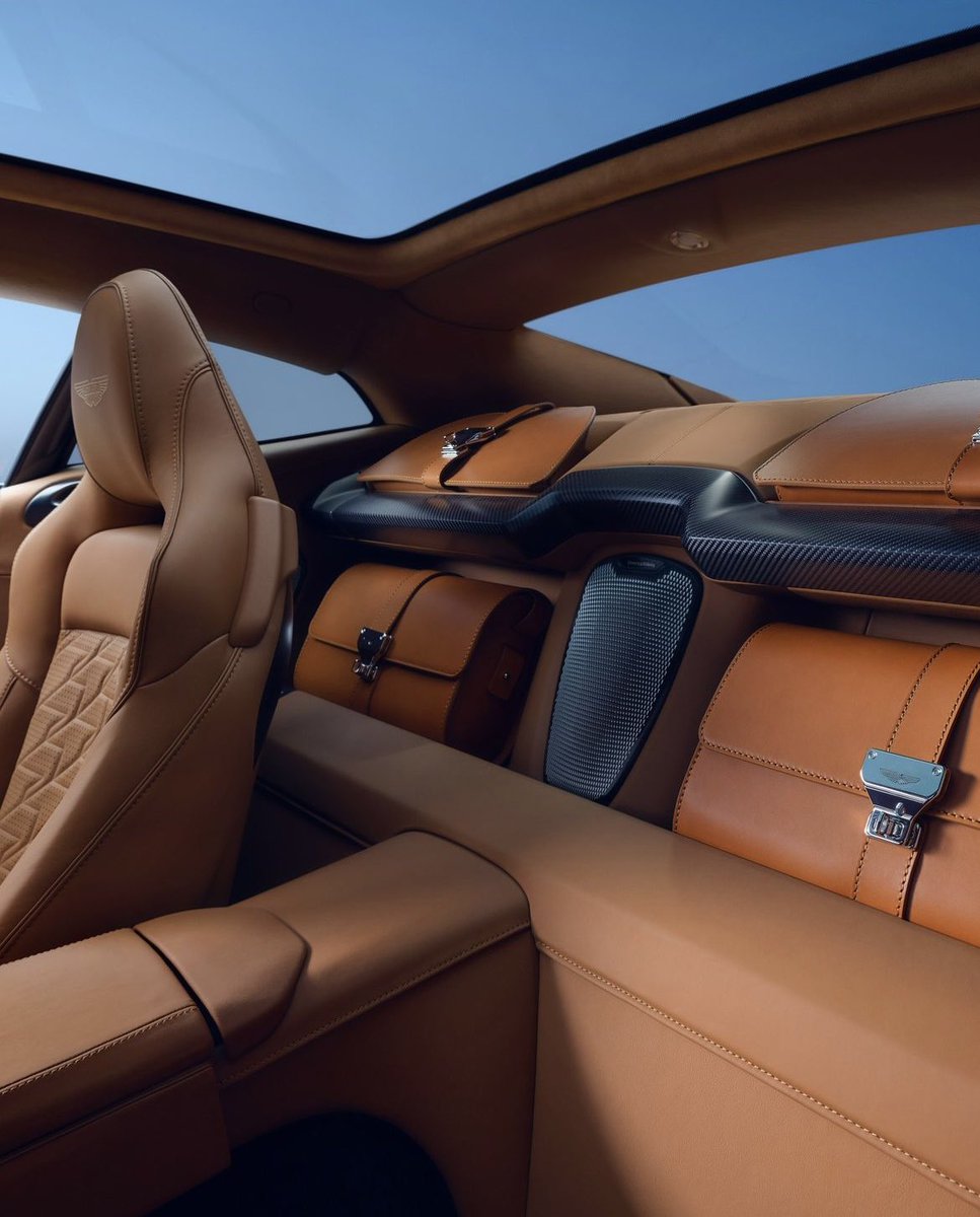 Vanquish’s unique 2-seat cabin is a sanctuary of elegance. The luggage area behind the seats, adorned with carbon fibre, leather and aluminium.

#AstonMartin #VeniVidiVanquish #ZENITHDRIVEN