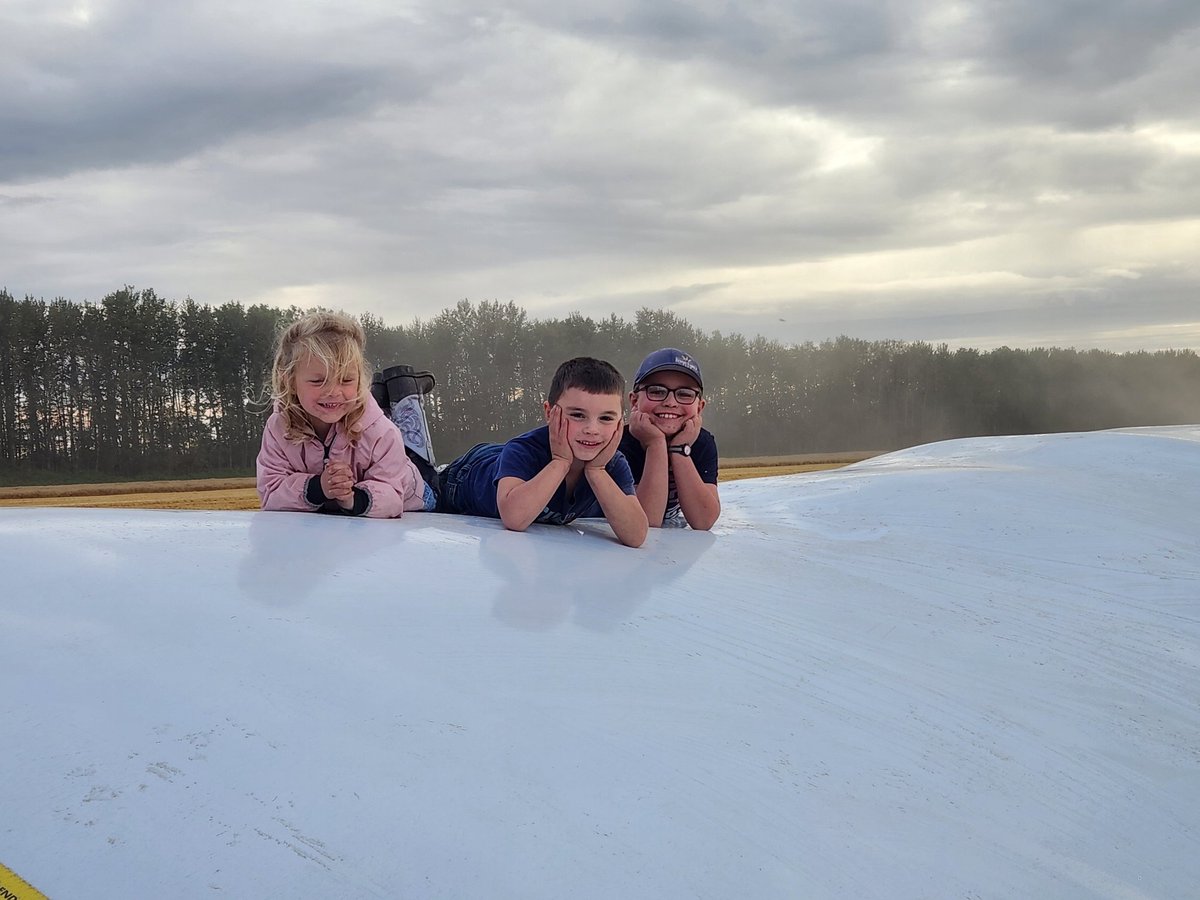 No iPad. No TV. Just give some farm kids a grain bag after field supper and they will love their best life.
